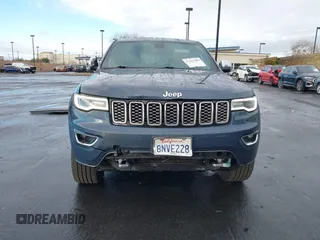 2019 Jeep Grand Cherokee Overland with VIN 1C4RJFCG6KC726690, listed as a IAAI auction lot 41421299 with 116,190 mi miles. Bid and sale history available at carsss.com. Image 6.