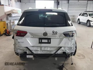 2018 Volkswagen Tiguan SEL z VIN 3VV3B7AX1JM167656, wystawiony jako IAAI lot #42658377 z przebiegiem 74 130 mil mil oraz . Historia ofert i sprzedaży dostępna na DreamBid. Obrazek 16.