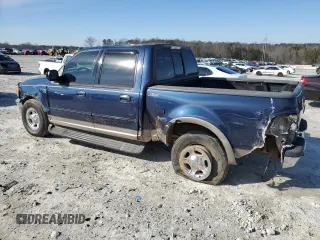 2002 Ford F-150 XLT with VIN 1FTRW07L52KA67609, listed as a Copart auction lot 87720715 with 177,615 mi miles and Salvage Title. Bid and sale history available at carsss.com. Image 2.