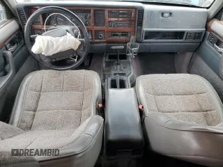 1995 Jeep Cherokee Country with VIN 1J4FJ78S5SL636284, listed as a Copart auction lot 76145234 with 104,048 mi miles and Salvage Title. Bid and sale history available at carsss.com. Image 8.