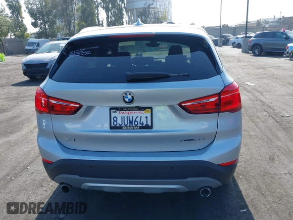 2019 BMW X1 xDrive28i with VIN WBXHT3C56K5L38658, listed as a IAAI auction lot 42496734 with 49,373 mi miles and . Bid and sale history available at DreamBid. Image 16.