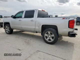 2018 Chevrolet Silverado 1500 LT with VIN 3GCUKREC3JG462083, listed as a Copart auction lot 56346705 with 166,454 mi miles and Clean Title. Bid and sale history available at DreamBid. Image 2.