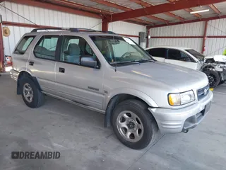 2001 Honda Passport LX z VIN 4S6CK58WX14402974, wystawiony jako IAAI lot #42374779 z przebiegiem 214 931 mil mil oraz . Historia ofert i sprzedaży dostępna na DreamBid. Obrazek 1.