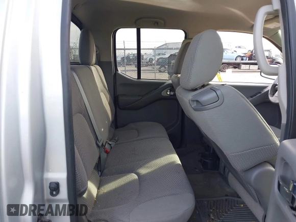 2014 Nissan Frontier SL z VIN 1N6AD0FV3EN767134, wystawiony jako IAAI lot #41463305 z przebiegiem 63 553 mil mil oraz . Historia ofert i sprzedaży dostępna na DreamBid. Obrazek 8.