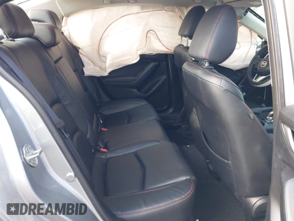 2014 Mazda 3 i Grand Touring with VIN JM1BM1W72E1196080, listed as a IAAI auction lot 42002800 with 88,772 mi miles. Bid and sale history available at carsss.com. Image 8.