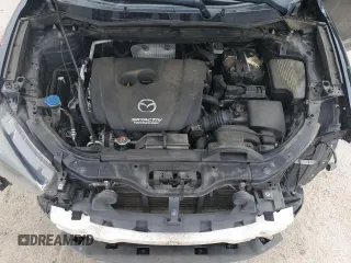 2016 Mazda CX-5 Grand Touring z VIN JM3KE2DY5G0676290, wystawiony jako Copart lot #54155325 z przebiegiem 124 743 mil mil oraz Szkoda całkowita • Salvage title. Historia ofert i sprzedaży dostępna na DreamBid. Obrazek 12.