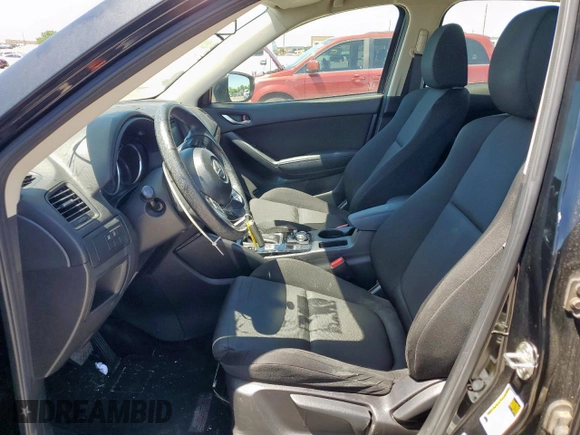 2016 Mazda CX-5 Sport z VIN JM3KE2BY3G0886115, wystawiony jako Copart lot #53803325 z przebiegiem Nie podano mil oraz Szkoda całkowita • Salvage title. Historia ofert i sprzedaży dostępna na DreamBid. Obrazek 7.
