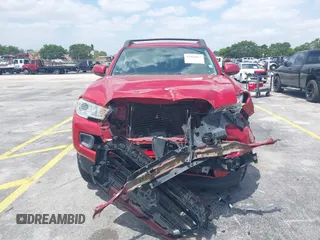 2016 Toyota Tacoma SR5 with VIN 5TFAX5GNXGX054633, listed as a IAAI auction lot 42088863 with 105,184 mi miles and . Bid and sale history available at DreamBid. Image 6.