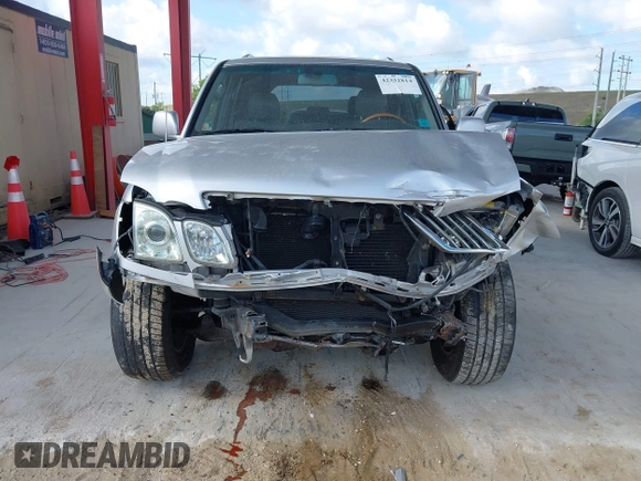 2006 Lexus LX 470 z VIN JTJHT00W864014757, wystawiony jako IAAI lot #42332814 z przebiegiem 131 641 mil mil oraz . Historia ofert i sprzedaży dostępna na DreamBid. Obrazek 6.