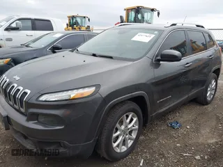 2015 Jeep Cherokee Latitude with VIN 1C4PJLCB6FW547788, listed as a IAAI auction lot 42177621 with 138,945 mi miles and . Bid and sale history available at carsss.com. Image 17.