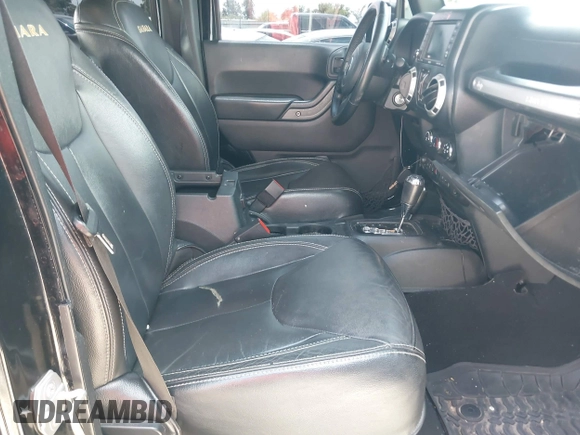 2015 Jeep Wrangler Unlimited Sahara with VIN 1C4HJWEG6FL572674, listed as a IAAI auction lot 42736266 with 97,024 mi miles and . Bid and sale history available at DreamBid. Image 5.