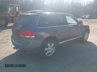 2005 Volkswagen Touareg 4.2L V8 with VIN WVGZM77L25D079655, listed as a IAAI auction lot 42033696 with 187,389 mi miles and . Bid and sale history available at DreamBid. Image 4.