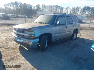 2004 Chevrolet Tahoe LT with VIN 1GNEK13Z74R106289, listed as a IAAI auction lot 41470666 with 211,641 mi miles. Bid and sale history available at carsss.com. Image 2.