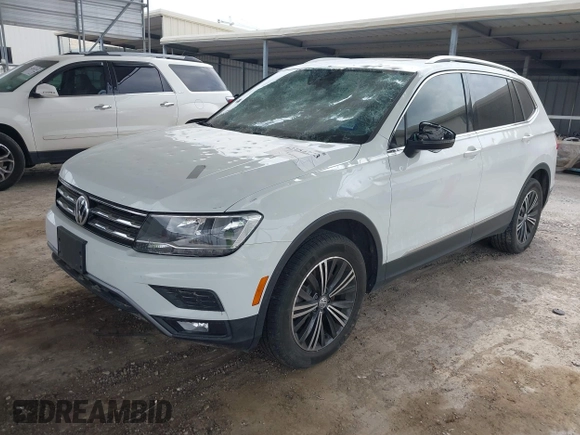 2018 Volkswagen Tiguan SEL with VIN 3VV2B7AX8JM120443, listed as a IAAI auction lot 42154773 with 70,256 mi miles and . Bid and sale history available at DreamBid. Image 2.
