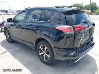 2016 Toyota RAV4 XLE with VIN 2T3WFREV4GW294428, listed as a IAAI auction lot 39168618 with 115,791 mi miles. Bid and sale history available at carsss.com. Image 3.