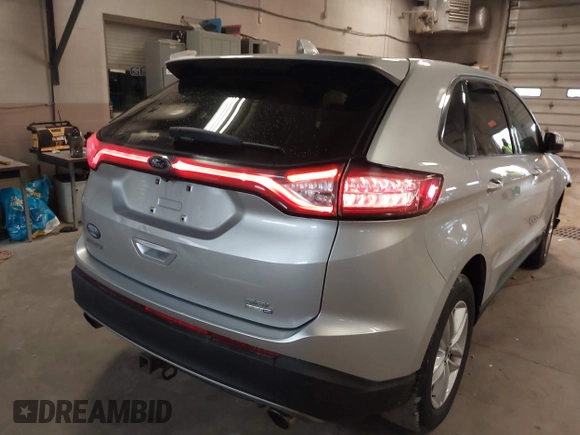 2015 Ford Edge SEL with VIN 2FMTK4J96FBB53500, listed as a IAAI auction lot 41974097 with 199,331 mi miles. Bid and sale history available at carsss.com. Image 4.