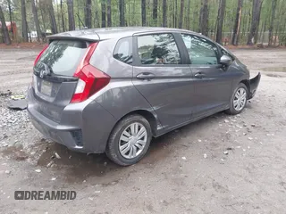 2017 Honda Fit LX with VIN JHMGK5H57HS011100, listed as a IAAI auction lot 41970951 with 53,087 mi miles. Bid and sale history available at carsss.com. Image 4.