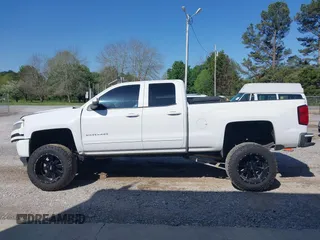 2016 Chevrolet Silverado 1500 LT with VIN 1GCVKREC4GZ106299, listed as a IAAI auction lot 41984118 with 181,626 mi miles and . Bid and sale history available at DreamBid. Image 14.