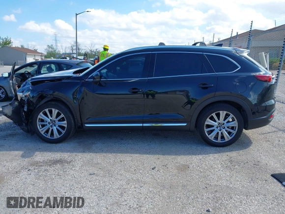 2021 Mazda CX-9 Signature with VIN JM3TCBEY1M0539786, listed as a IAAI auction lot 42264611 with 51,168 mi miles and . Bid and sale history available at DreamBid. Image 14.