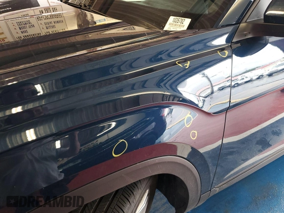 2023 Volkswagen Atlas SE z VIN 1V2HR2CA5PC527628, wystawiony jako IAAI lot #42569146 z przebiegiem 27 424 mil mil oraz . Historia ofert i sprzedaży dostępna na DreamBid. Obrazek 17.
