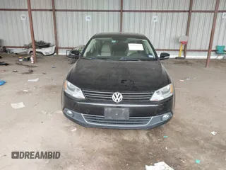 2012 Volkswagen Jetta Sedan SEL w/Sunroof with VIN 3VWLX7AJ5CM379634, listed as a IAAI auction lot 41634048 with 209,586 mi miles. Bid and sale history available at carsss.com. Image 13.