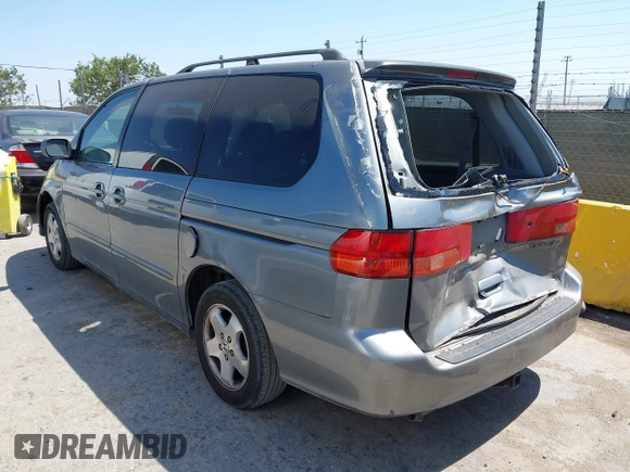 2001 Honda Odyssey EX z VIN 2HKRL18621H541553, wystawiony jako IAAI lot #42469447 z przebiegiem 241 701 mil mil oraz . Historia ofert i sprzedaży dostępna na DreamBid. Obrazek 3.