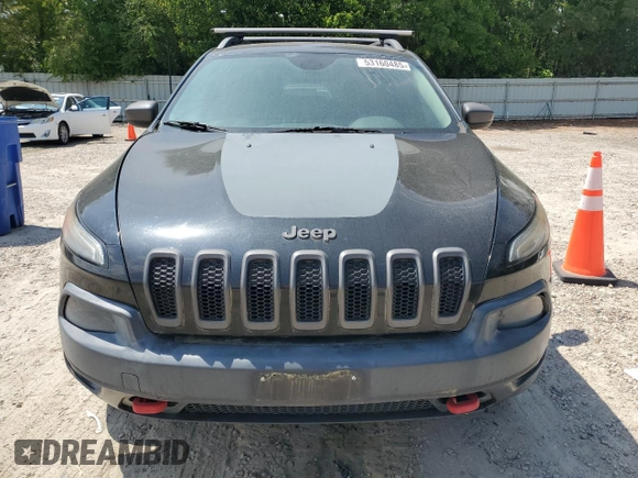 2014 Jeep Cherokee Trailhawk with VIN 1C4PJMBS1EW242527, listed as a Copart auction lot 53160485 with 104,074 mi miles and Salvage Title. Bid and sale history available at carsss.com. Image 5.