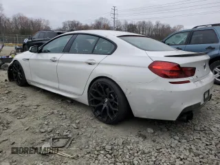 2014 BMW 6 Series 650i xDrive z VIN WBA6B4C54ED371324, wystawiony jako Copart lot #49016325 z przebiegiem 113 395 mil mil oraz Szkoda całkowita • Salvage title. Historia ofert i sprzedaży dostępna na DreamBid. Obrazek 2.