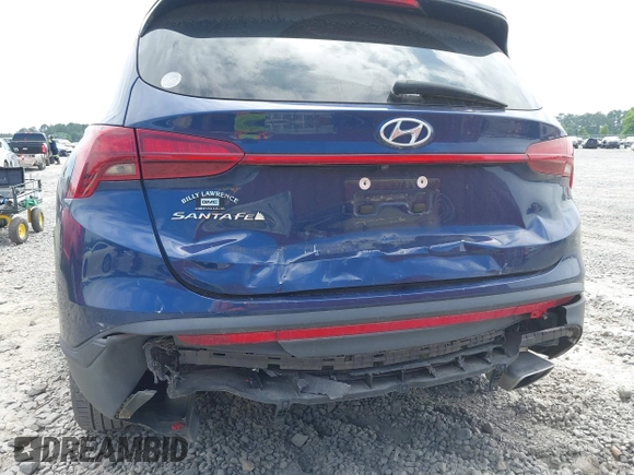 2021 Hyundai Santa Fe SE with VIN 5NMS14AJ2MH323542, listed as a IAAI auction lot 42182576 with 69,385 mi miles and . Bid and sale history available at DreamBid. Image 6.