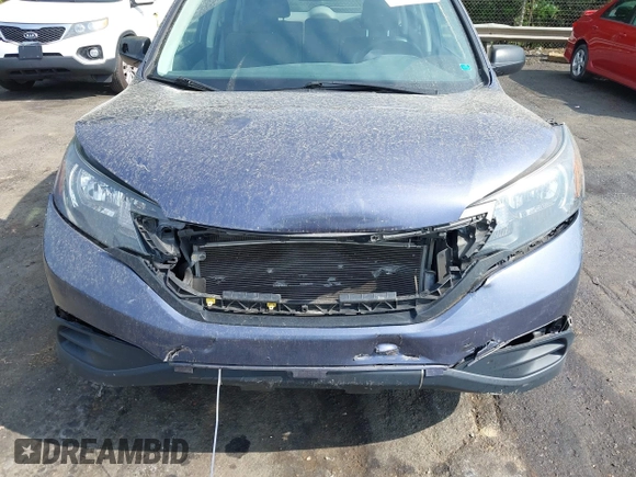 2014 Honda CR-V LX with VIN 3CZRM3H34EG702492, listed as a IAAI auction lot 42096296 with 63,748 mi miles and . Bid and sale history available at carsss.com. Image 6.