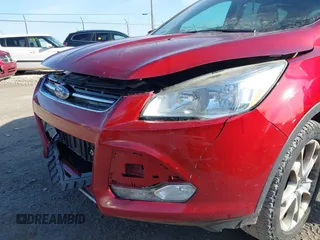 2015 Ford Escape Titanium z VIN 1FMCU9J9XFUC75357, wystawiony jako IAAI lot #41705474 z przebiegiem 198 381 mil mil oraz . Historia ofert i sprzedaży dostępna na DreamBid. Obrazek 17.