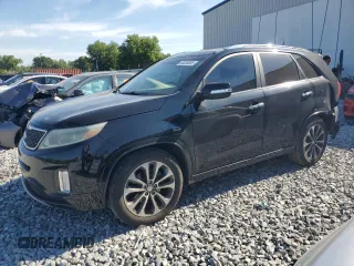 2014 Kia Sorento SX Limited with VIN 5XYKW4A73EG477906, listed as a Copart auction lot 50036365 with 124,466 mi miles and Salvage Title. Bid and sale history available at carsss.com. Image 1.