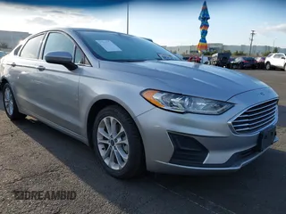 2020 Ford Fusion Hybrid SE with VIN 3FA6P0LU6LR171270, listed as a IAAI auction lot 41919266 with 106,438 mi miles. Bid and sale history available at carsss.com. Image 1.