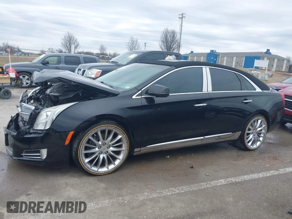 2013 Cadillac XTS Platinum z VIN 2G61V5S37D9194227, wystawiony jako IAAI lot #41510449 z przebiegiem 114 243 mil mil oraz . Historia ofert i sprzedaży dostępna na DreamBid. Obrazek 14.