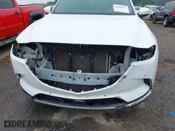 2021 Mazda CX-9 Signature with VIN JM3TCBEY4M0517118, listed as a IAAI auction lot 42400675 with 56,260 mi miles and . Bid and sale history available at DreamBid. Image 20.