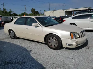 2003 Cadillac DeVille DTS z VIN 1G6KF57933U147843, wystawiony jako Copart lot #55875195 z przebiegiem 160 814 mil mil oraz Szkody całkowita. Historia ofert i sprzedaży dostępna na DreamBid. Obrazek 4.