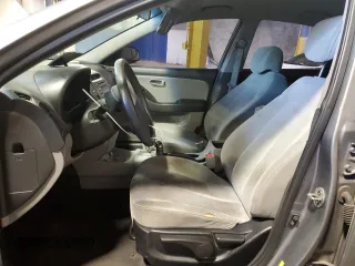 2009 Hyundai Elantra GLS with VIN KMHDU46DX9U787838, listed as a Copart auction lot 61500845 with 146,127 mi miles and Salvage title. Bid and sale history available at DreamBid. Image 7.