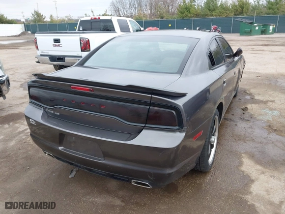 2014 Dodge Charger SE with VIN 2C3CDXBG8EH357664, listed as a IAAI auction lot 41860609 with 94,918 mi miles. Bid and sale history available at carsss.com. Image 4.