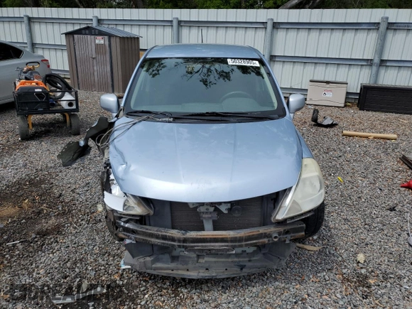 2011 Nissan Versa S with VIN 3N1BC1CP0BL439383, listed as a Copart auction lot 50328905 with 126,850 mi miles and Salvage title. Bid and sale history available at DreamBid. Image 5.