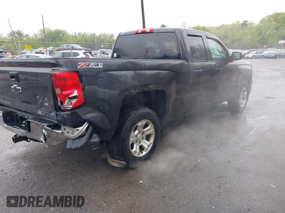 2014 Chevrolet Silverado 1500 LT with VIN 1GCVKREC0EZ181238, listed as a IAAI auction lot 42155213 with 171,893 mi miles and . Bid and sale history available at DreamBid. Image 4.