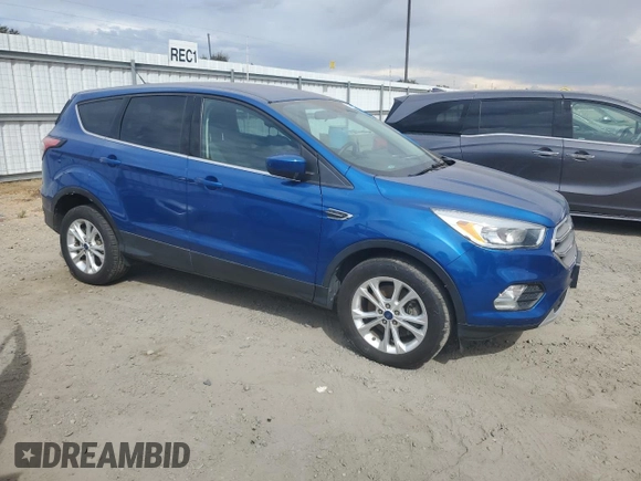 2017 Ford Escape SE with VIN 1FMCU9GDXHUC51686, listed as a Copart auction lot 72054814 with 96,231 mi miles and Clean Title. Bid and sale history available at DreamBid. Image 4.
