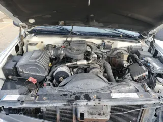 1998 Chevrolet Tahoe z VIN 1GNEK13R7WJ340188, wystawiony jako Copart lot #52177815 z przebiegiem 217 850 mil mil oraz Szkody całkowita. Historia ofert i sprzedaży dostępna na DreamBid. Obrazek 14.