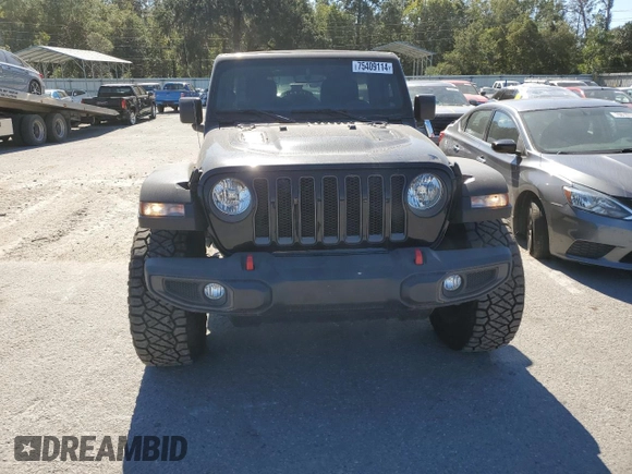 2023 Jeep Wrangler Rubicon z VIN 1C4HJXFN2PW617435, wystawiony jako Copart lot #75409114 z przebiegiem 12 185 mil mil oraz Szkoda całkowita • Salvage title. Historia ofert i sprzedaży dostępna na DreamBid. Obrazek 5.