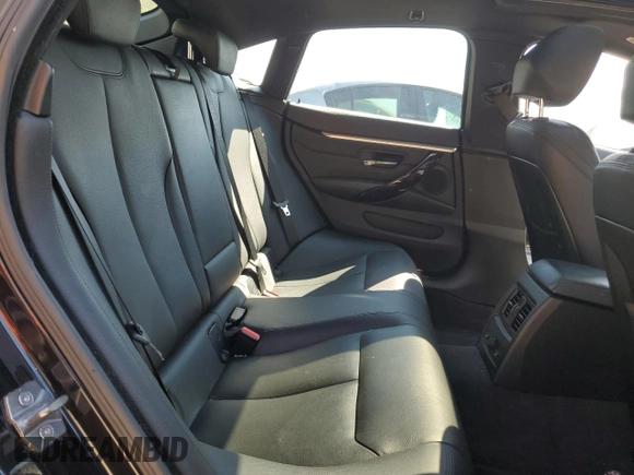2015 BMW 4 Series 428i xDrive with VIN WBA4A7C58FD413734, listed as a Copart auction lot 50252325 with 74,629 mi miles and Salvage title. Bid and sale history available at DreamBid. Image 10.