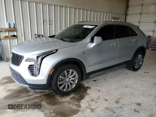 2019 Cadillac XT4 FWD Premium Luxury with VIN 1GYFZCR46KF198424, listed as a Copart auction lot 55465185 with 84,706 mi miles and Salvage title. Bid and sale history available at DreamBid. Image 1.