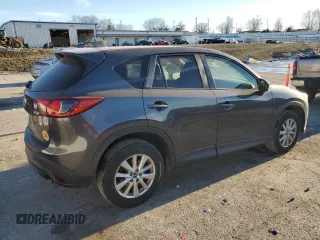 2015 Mazda CX-5 Touring with VIN JM3KE2CY0F0439125, listed as a Copart auction lot 43324945 with 210,404 mi miles and Clean Title. Bid and sale history available at DreamBid. Image 3.
