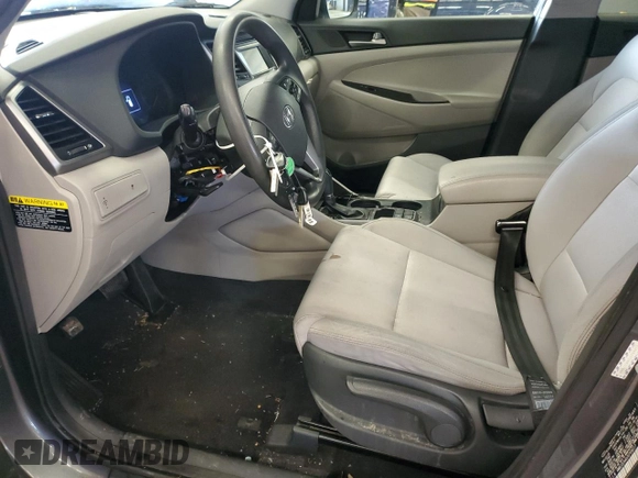 2018 Hyundai Tucson SE z VIN KM8J2CA40JU769217, wystawiony jako Copart lot #50214755 z przebiegiem 105 311 mil mil oraz Szkody całkowita. Historia ofert i sprzedaży dostępna na DreamBid. Obrazek 7.