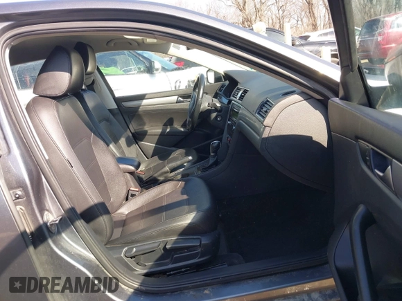 2015 Volkswagen Passat 1.8T Limited Edition with VIN 1VWAT7A33FC015366, listed as a IAAI auction lot 41769888 with 129,117 mi miles. Bid and sale history available at carsss.com. Image 5.