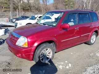 2004 Suzuki XL-7 LX with VIN JS3TX92V844110977, listed as a IAAI auction lot 41343611 with 64,773 mi miles. Bid and sale history available at carsss.com. Image 2.