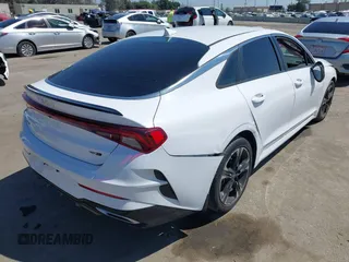 2022 Kia K5 GT-Line z VIN 5XXG64J28NG112507, wystawiony jako IAAI lot #41998172 z przebiegiem 43 915 mil mil oraz . Historia ofert i sprzedaży dostępna na DreamBid. Obrazek 4.
